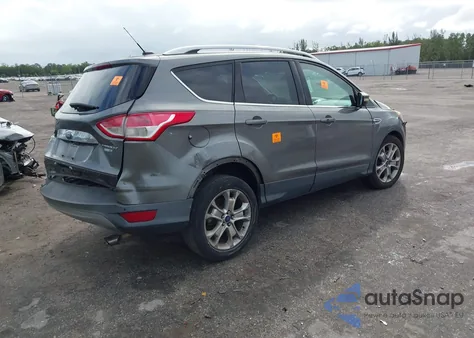 2014 Ford Escape Titanium z USA, uszkodzony, nr VIN 1FMCU9J92EUD41334